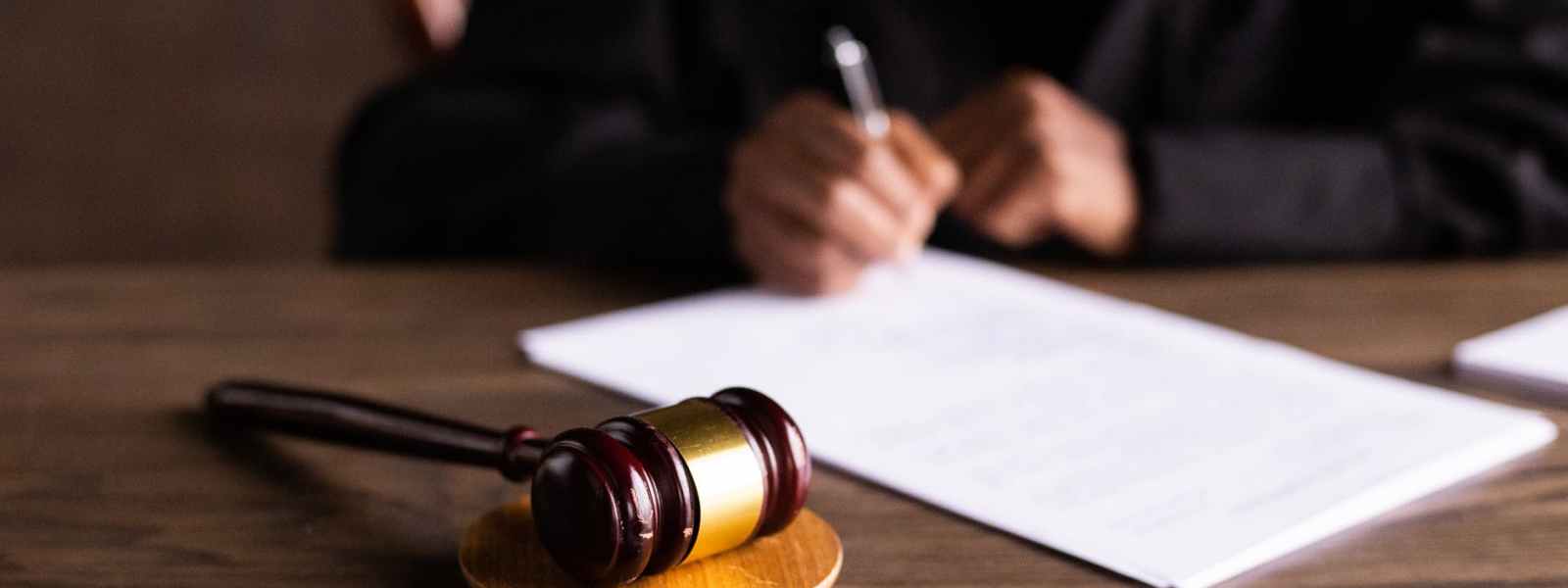 judge signing on the papers