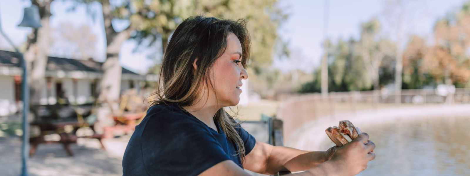 woman holding a sandwich