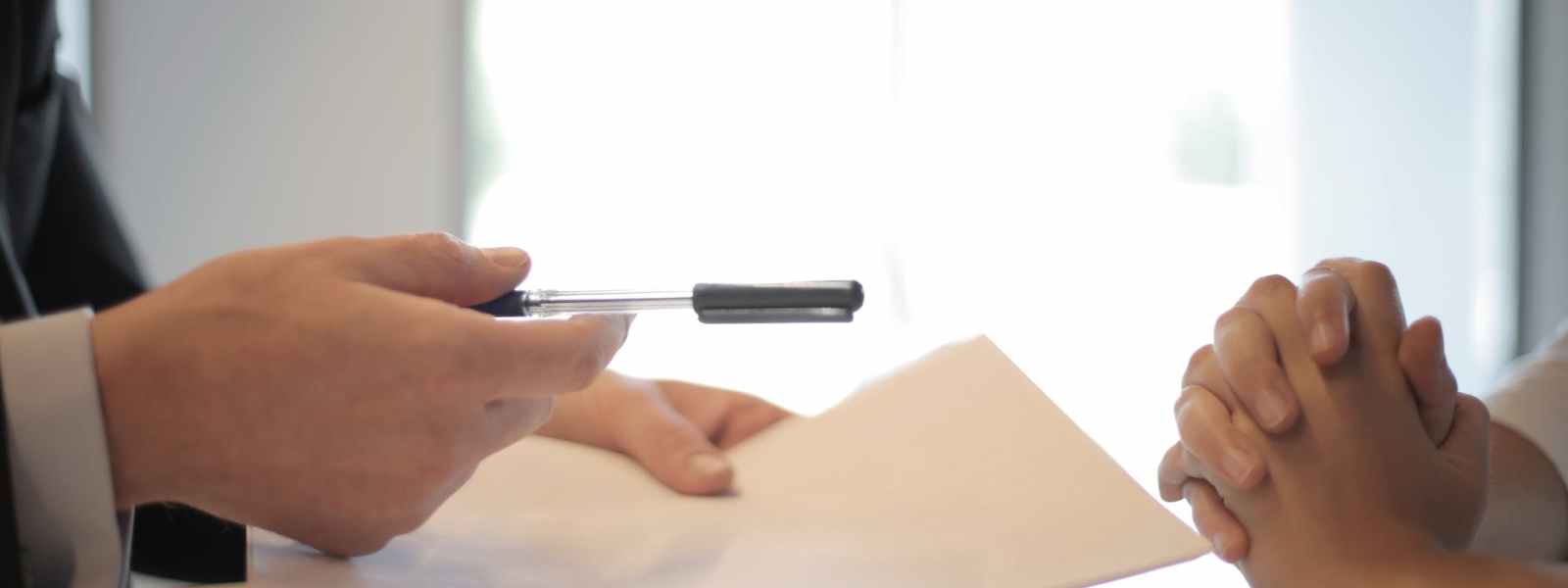 crop businessman giving contract to woman to sign