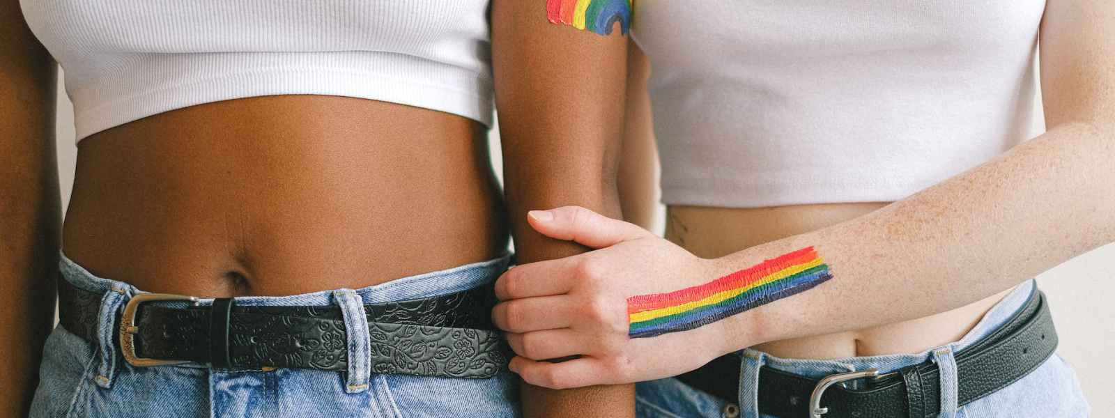 women with gay pride body paint