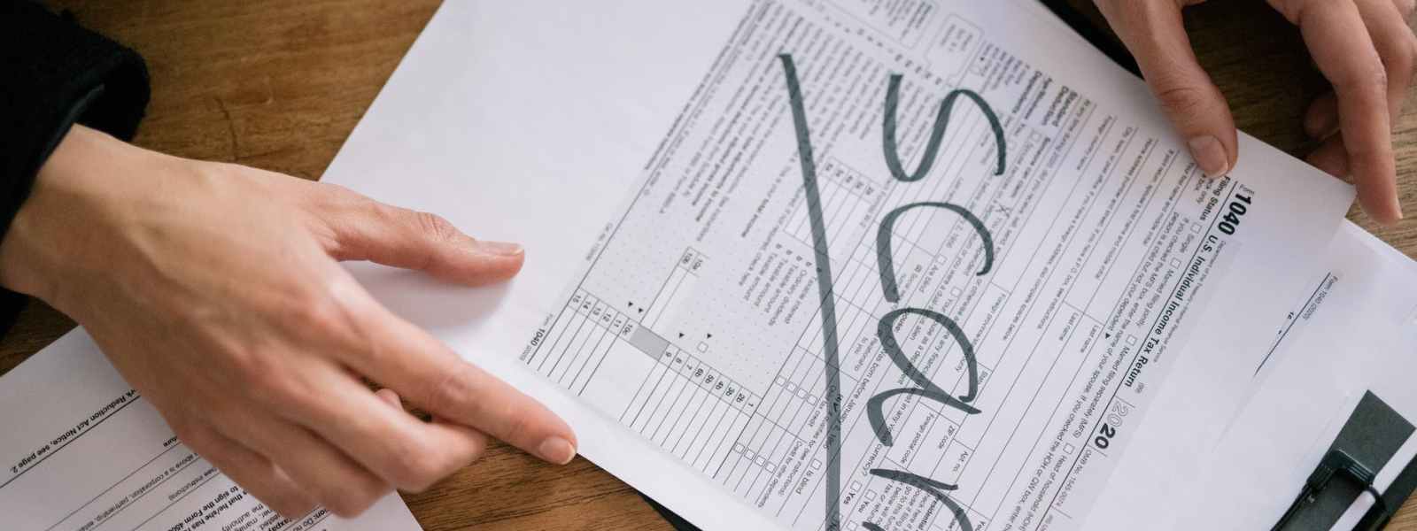 a tax form with a word scam on its face