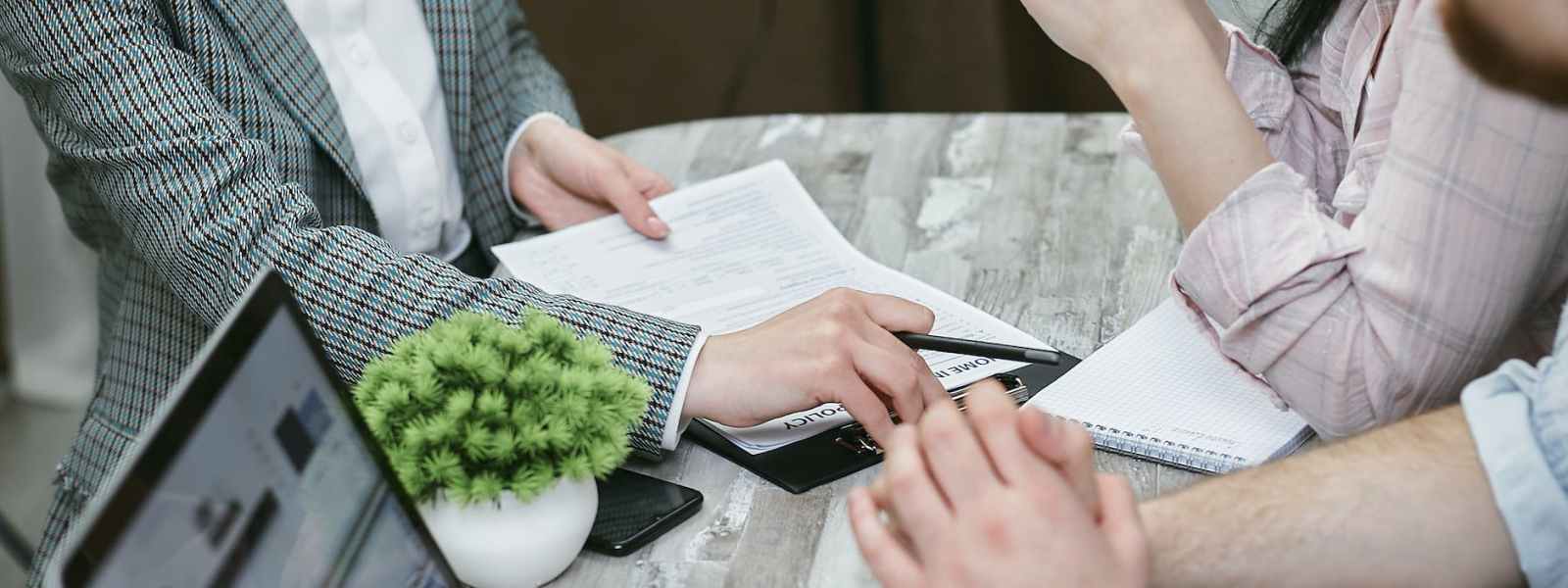 a woman holding a contract